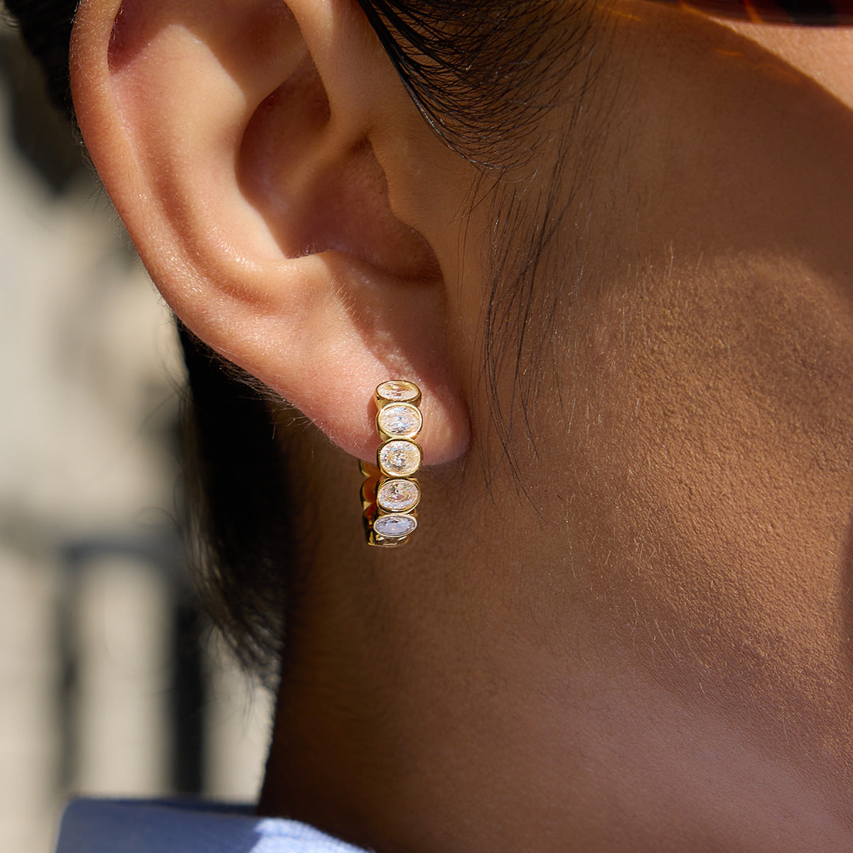 18K titanium steel egg-shaped zirconia earrings