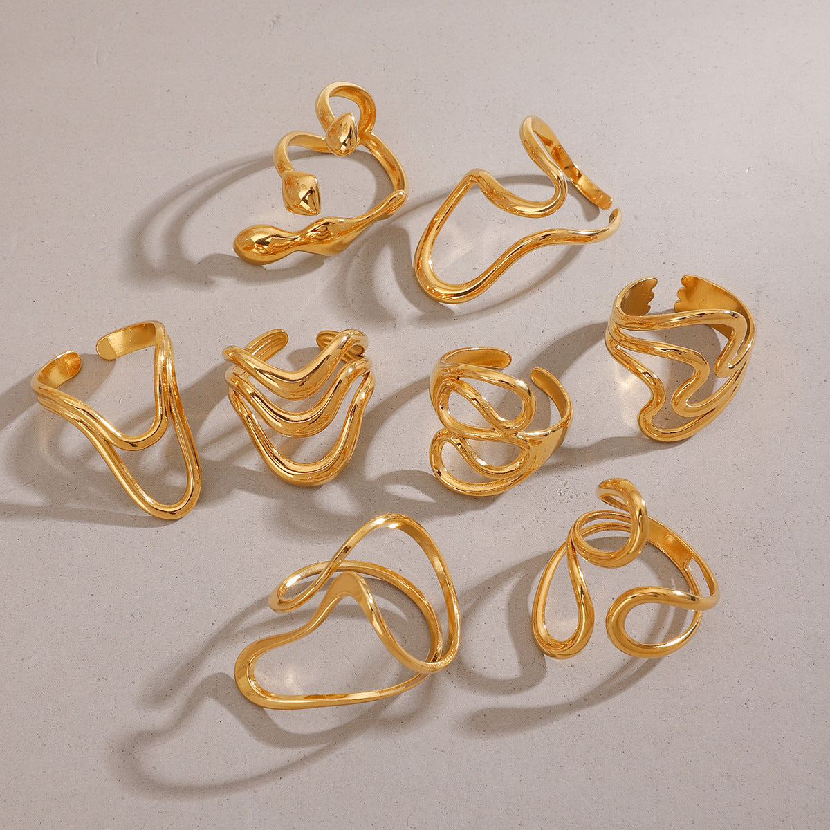 Titanium steel irregularly hollowed-out open ring